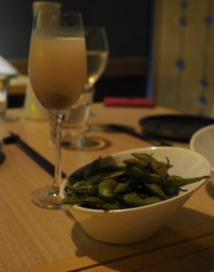 Bellinis and bowl of edamame
