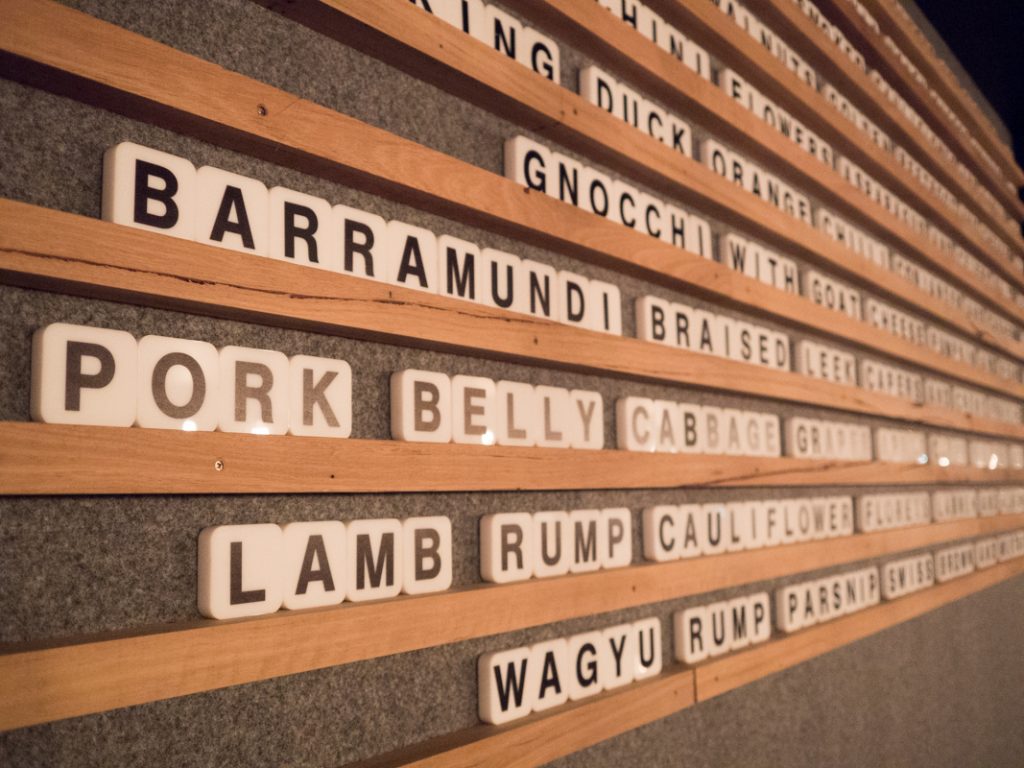 "The menu sit on the main wall, spelled out with individual letters"