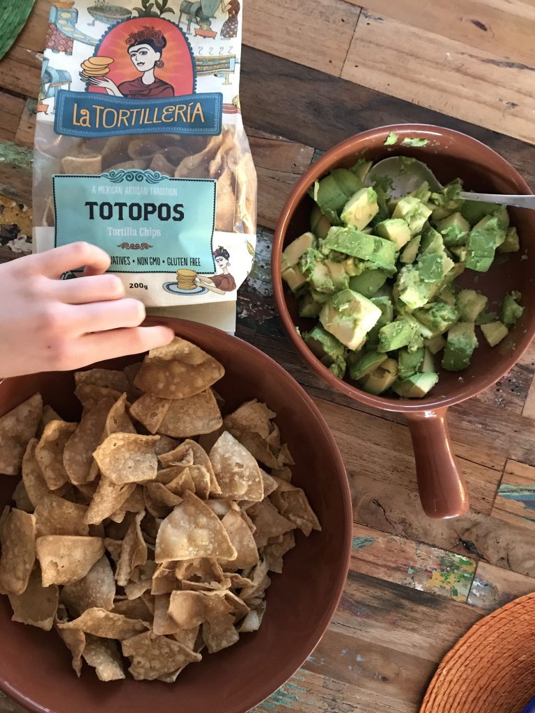 totopos (corn chips) and our rustic Guacamole.